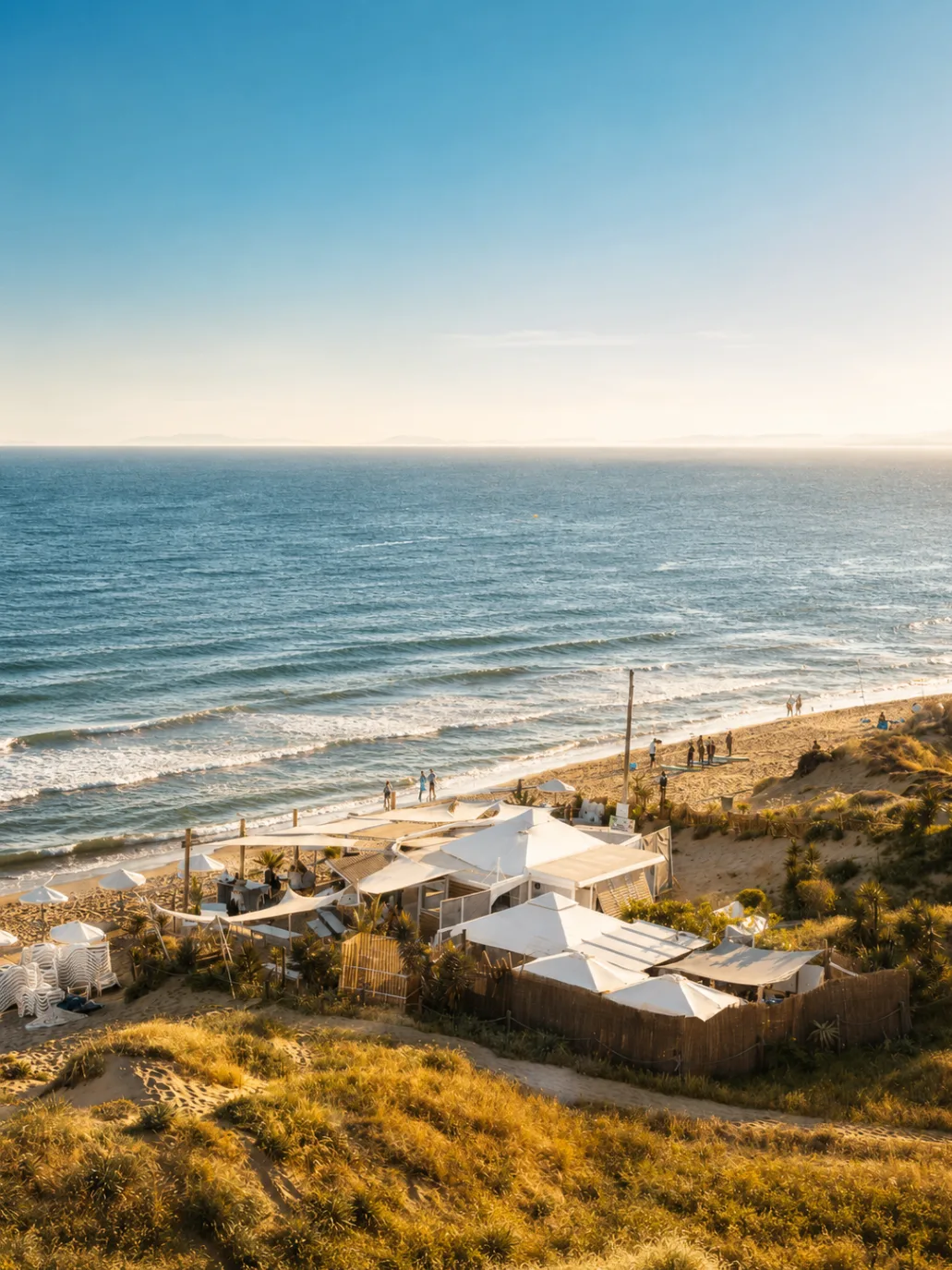 SYLT Marbella overview from the dunes showing the full beach club and shoreline